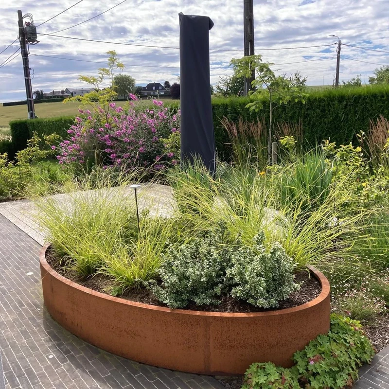 Jardinière en acier corten elliptique avec fond 200x120x60 cm