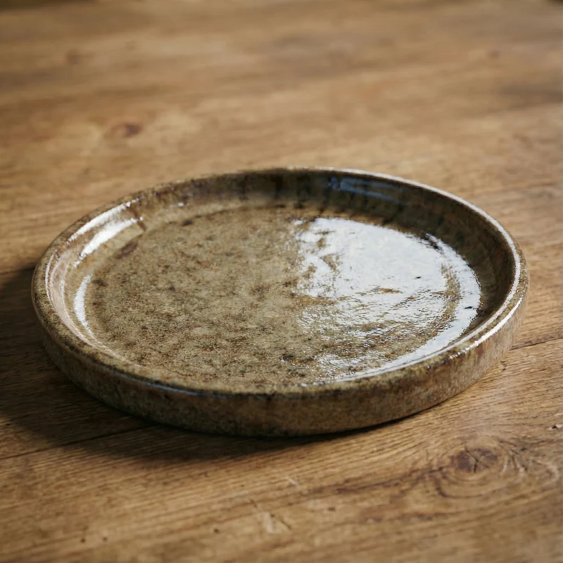 Soucoupe 16cm bronze sablé faite à la main en terre cuite émaillée