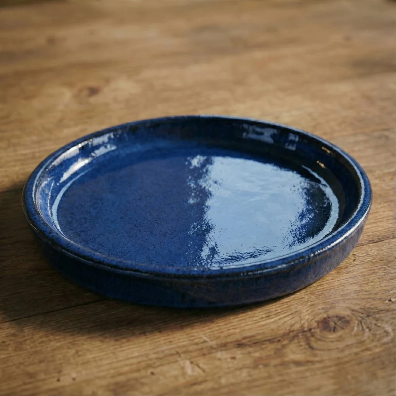Soucoupe 39cm bleu antique faite à la main en terre cuite émaillée