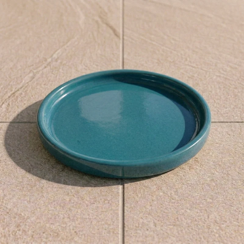 Soucoupe 16cm bleu pétrole faite à la main en terre cuite émaillée