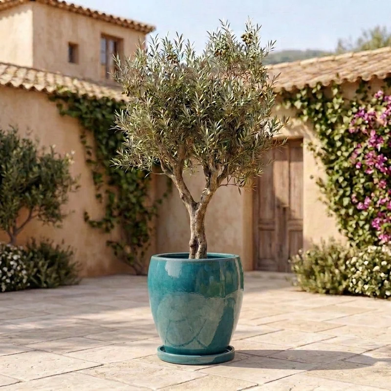 Soucoupe 35cm bleu pétrole faite à la main en terre cuite émaillée