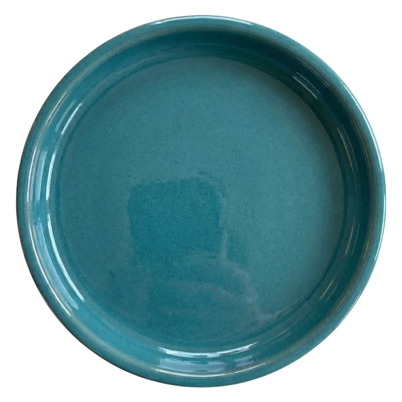 Soucoupe 29cm bleu pétrole faite à la main en terre cuite émaillée
