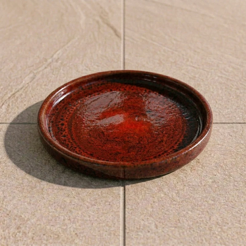 Soucoupe 21cm rouge brique faite à la main en terre cuite émaillée