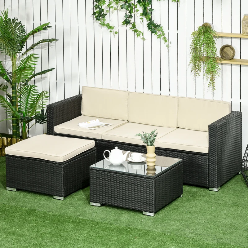 Outsunny Conjunto de Muebles de Ratán de Jardín 3 Piezas Muebles de Ratán Exterior Sofá de 3 Plazas con Cojines Acolchados Mesa de Centro con Tablero de Vidrio Templado y Reposapiés Anti-UV Negro